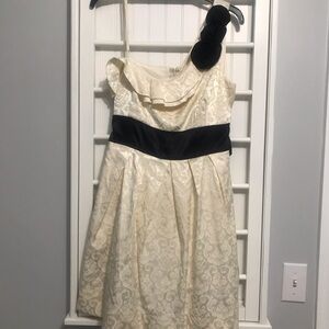 Brand new cream with black cocktail dress